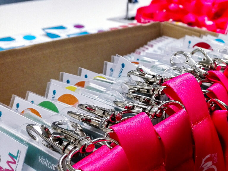 Branded lanyards and badges with color-coding for groups